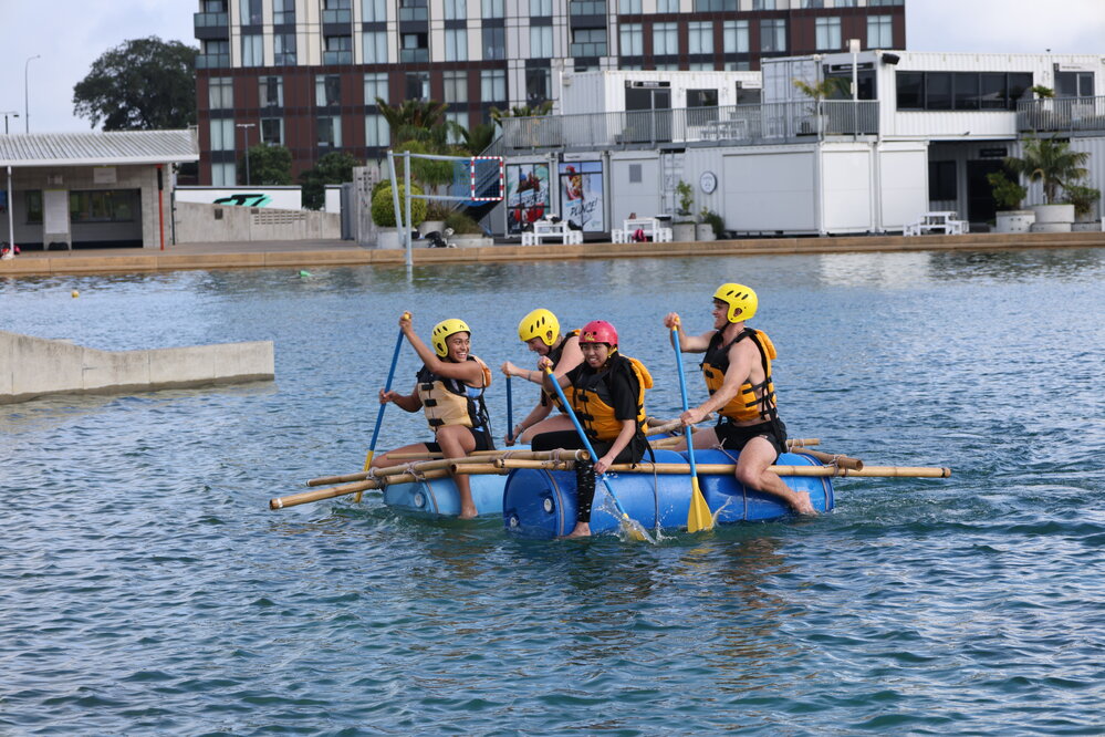 2023 Students and Inspiring Explorers paddle a completed raft
