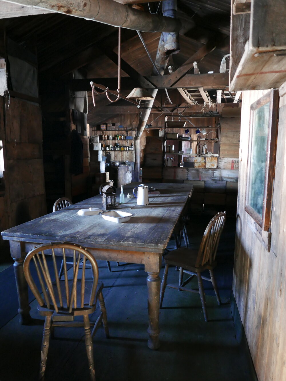 2018-19 Wardroom table inside Scott's 'Terra Nova' hut, Cape Evans
