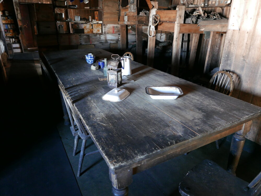 2018-19 Wardroom table inside Scott's 'Terra Nova' hut, Cape Evans