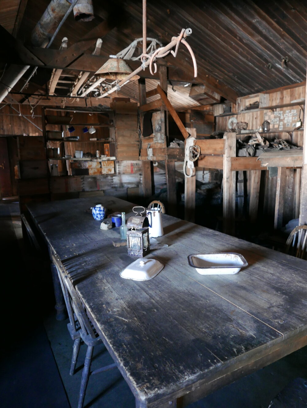 2018-19 Wardroom table inside Scott's 'Terra Nova' hut, Cape Evans