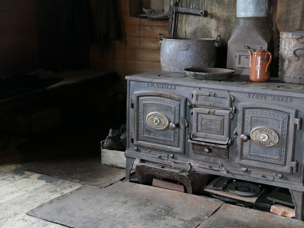 2018-19 Mrs Sam stove inside Shackleton's 'Nimrod' hut, Cape Royds