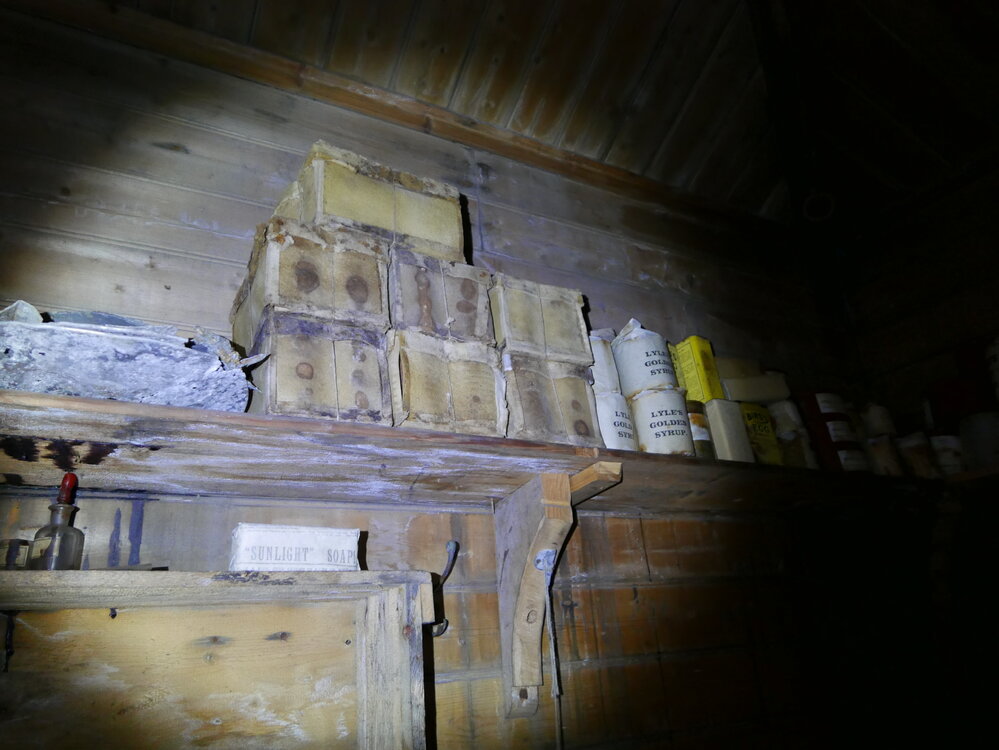 2018-19 Food provisions on shelves inside Shackleton's 'Nimrod' hut, Cape Royds