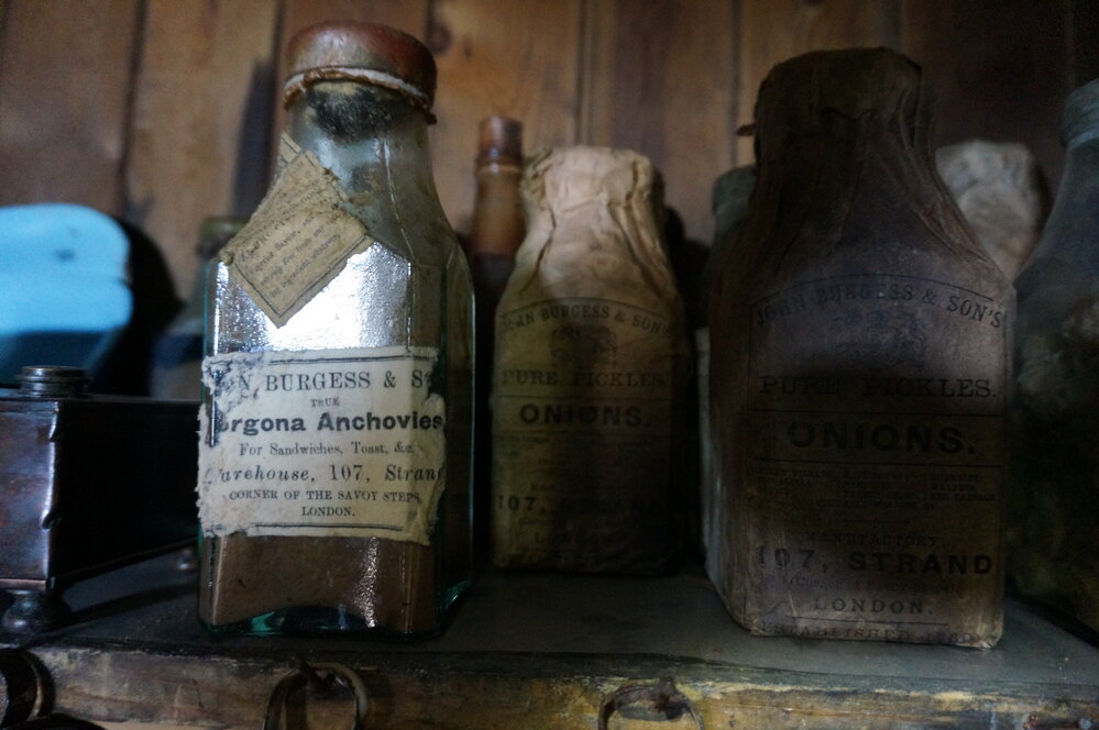 2018-19 Bottle of anchovies inside Scot's 'Terra Nova' hut, Cape Evans