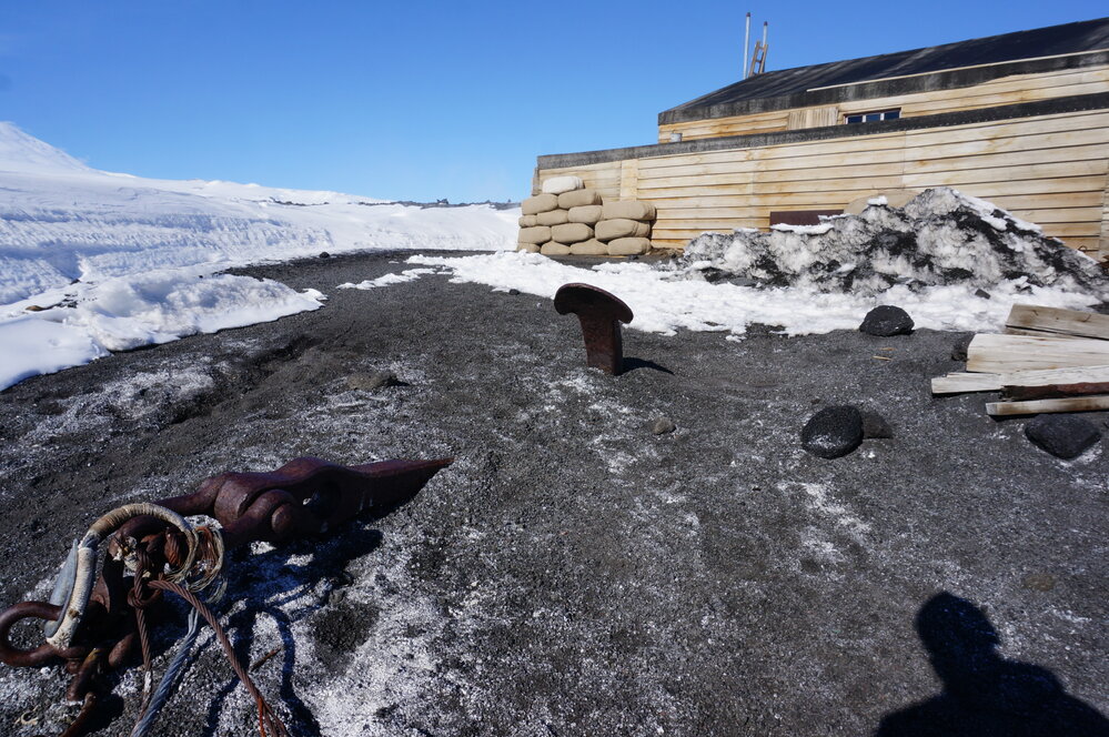 2018-19 Aurora anchor outside Scott's 'Terra Nova' hut, Cape Evans