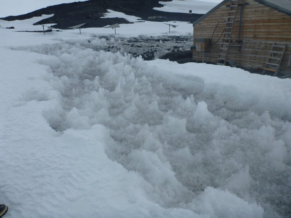Scoria spread on snow, Scott's 'Terra Nova' hut (003)