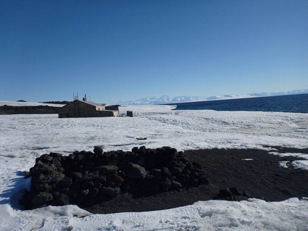 Stone hut ruins and Scott's 'Terra Nova' hut