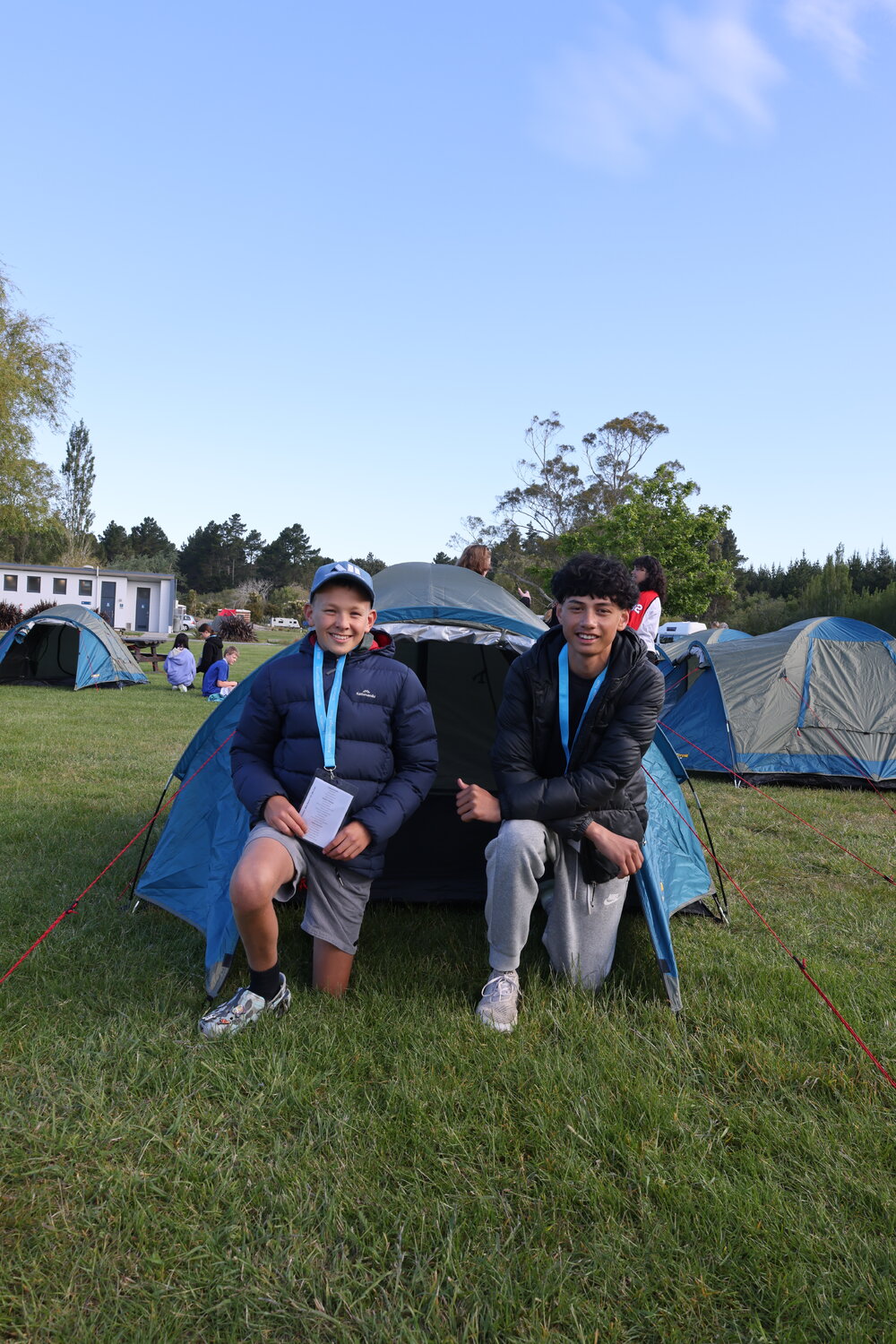 Young Inspiring Explorers with their pitched tent