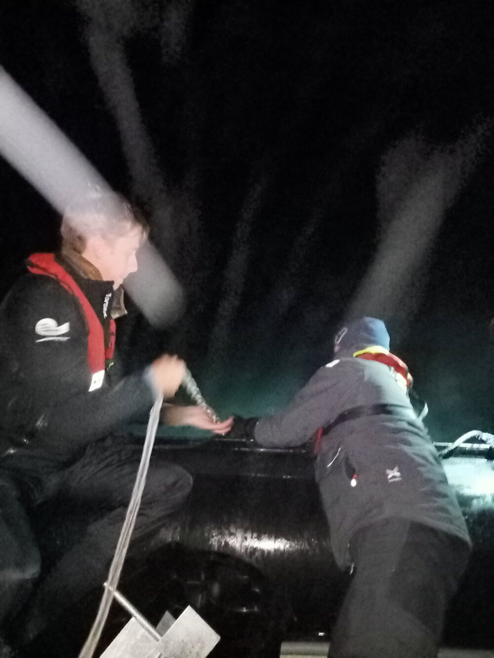Inspiring Explorers taking Mangōpare Temperature Sensor measurements from a zodiac (003)
