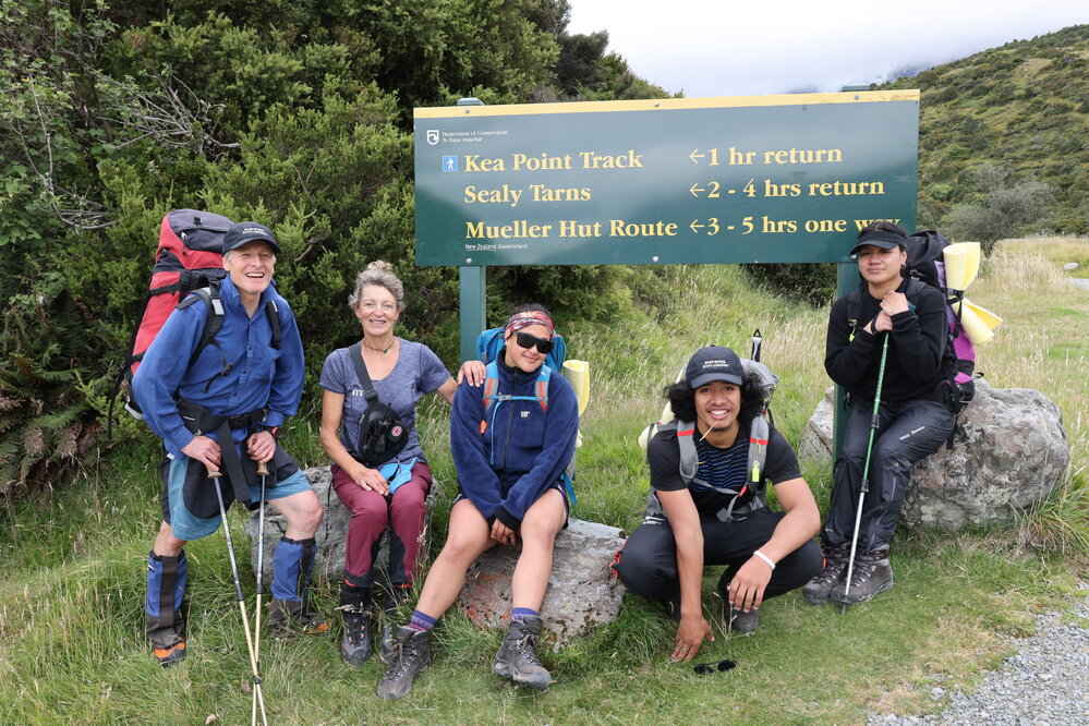 Group photo at Department of Conservation sign (001)
