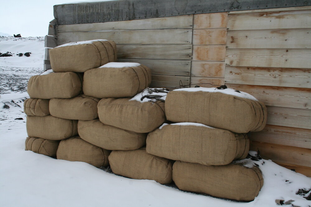 2013-14 Wrapped fodder bales outside Scott's 'Terra Nova' hut, Cape Evans