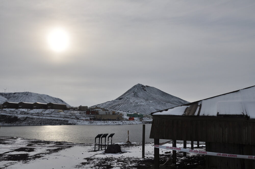 2013-14 Sun through the clouds over McMurdo Station
