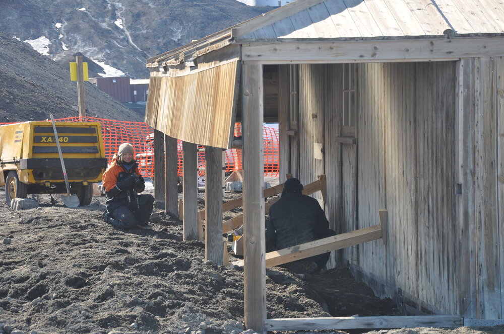 2013-14 Nicola Dunn photographing work at Scott's 'Discovery' hut, Hut Point