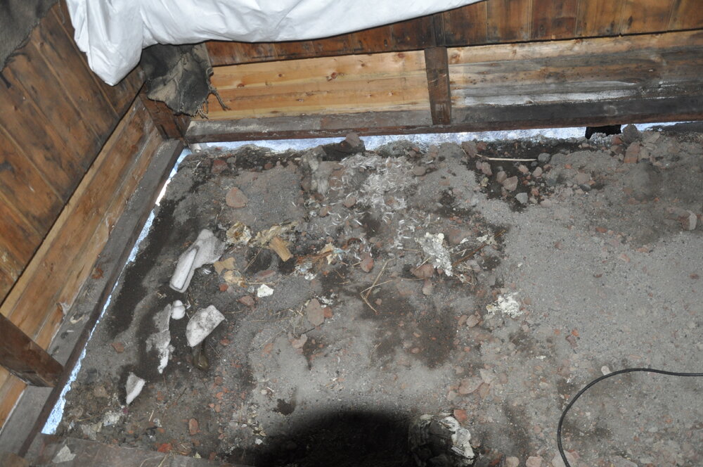 2013-14 Floorboards removed inside Scott's 'Discovery' hut, Hut Point