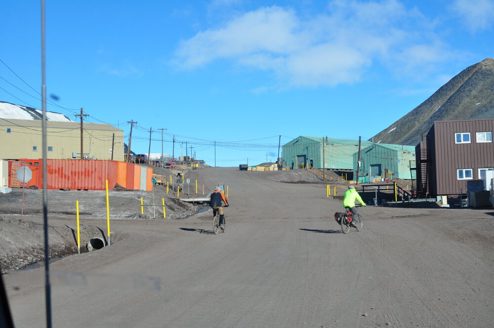 2013-14 Al Fastier and Gord Macdonald biking through McMurdo Station