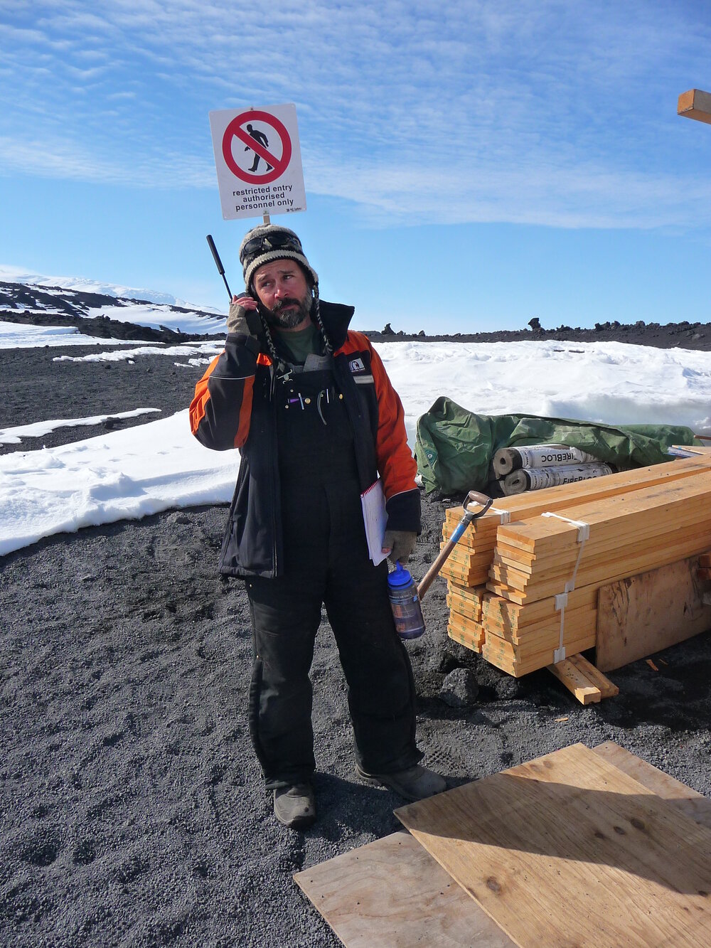 2009-10 AHT's Gord Macdonald on satellite phone at Cape Evans
