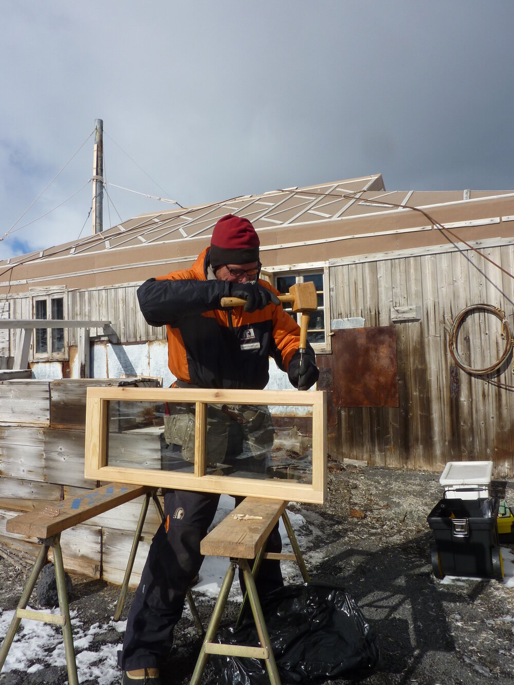 2009-10 AHT's Martin Wenzel working outside Shackleton's 'Nimrod' hut, Cape Royds