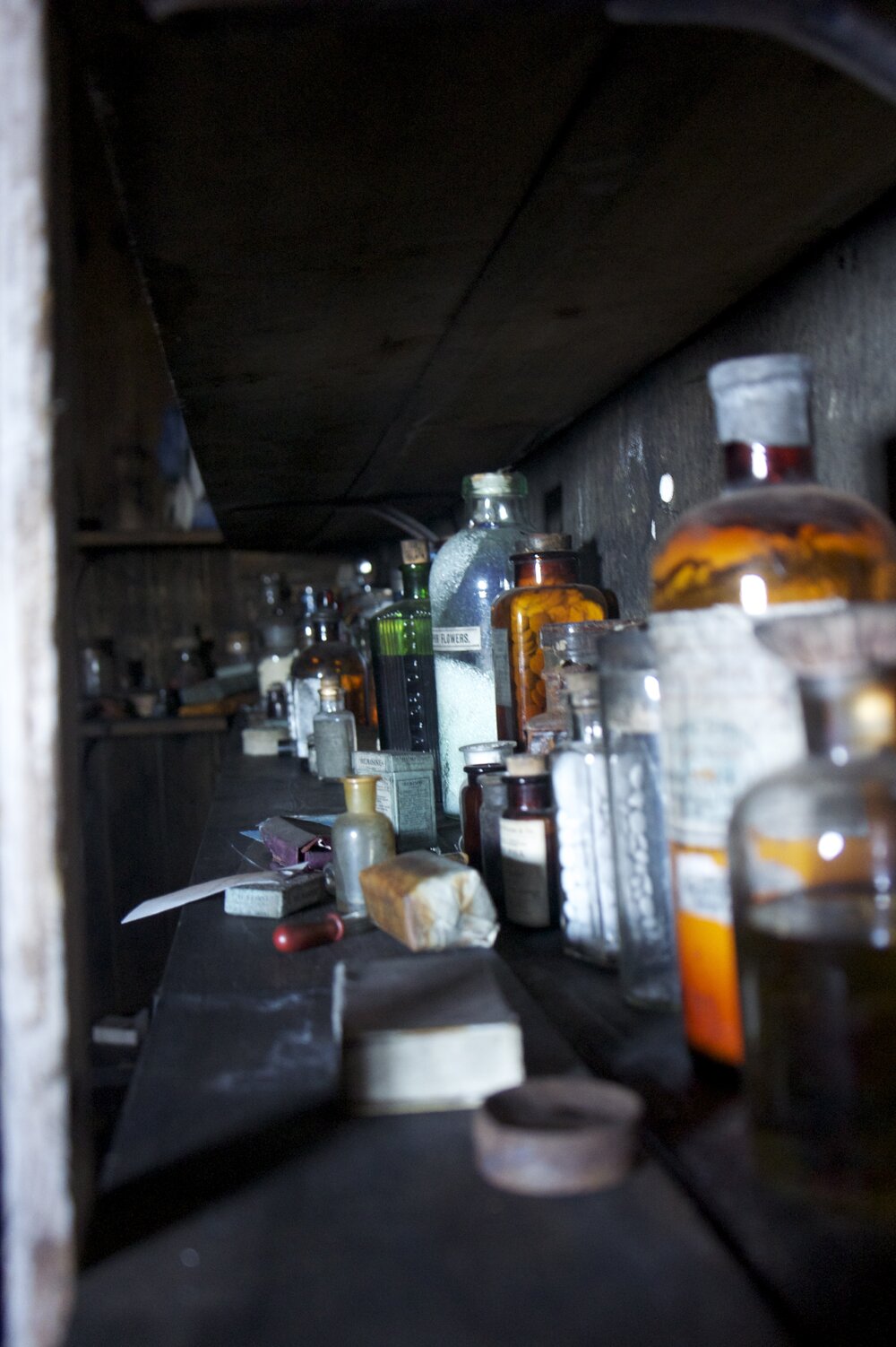 2012 Scott's 'Terra Nova' hut, interior, chemical bottles on shelving