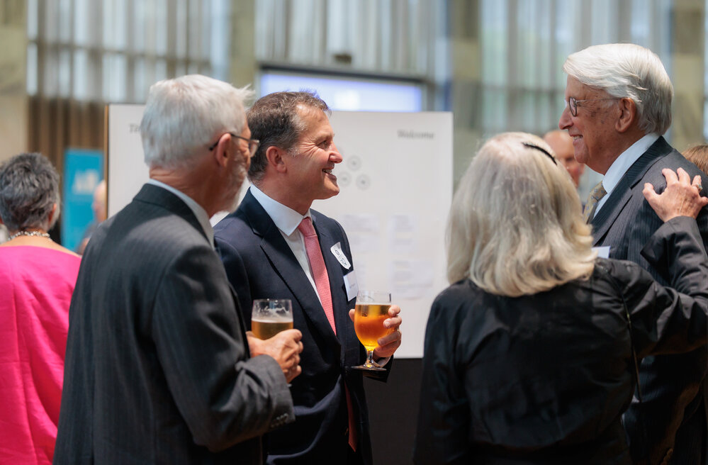 Nigel Watson talking to guests