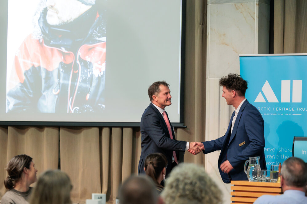 Nigel Watson accepting gift (002)