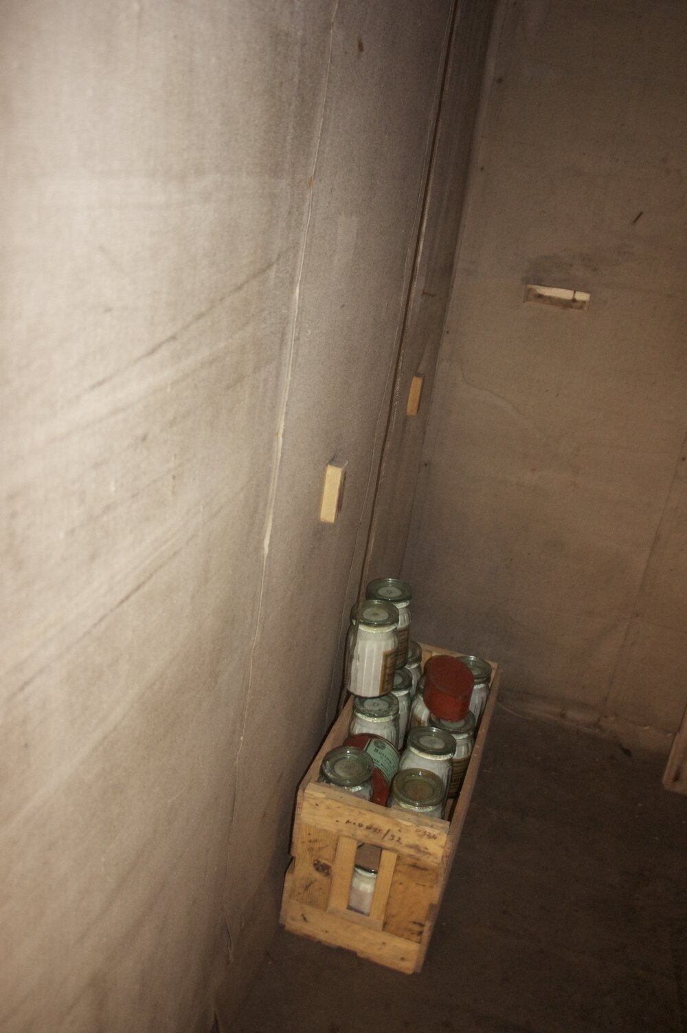 2012 Shackleton's 'Nimrod' hut interior, crate of salt jars in Shackleton's room