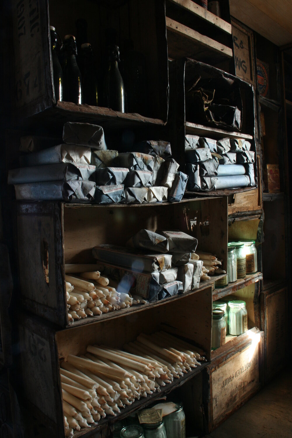 2010-11 Candles stacked inside Shackleton's 'Nimrod' hut, Cape Royds