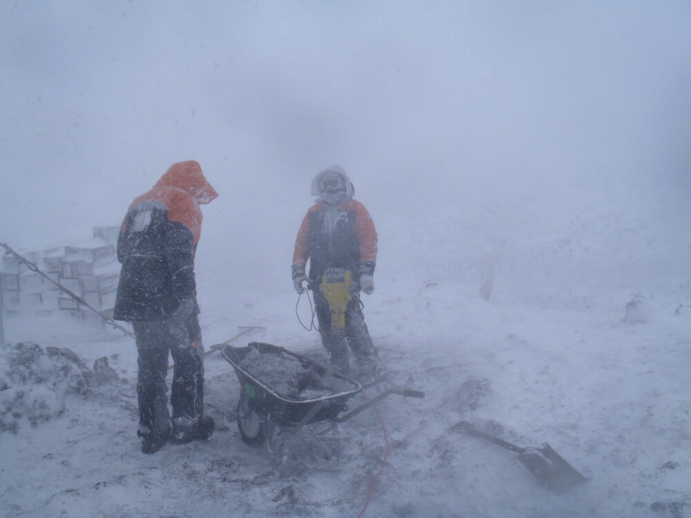 2010-11 Al Fastier working in bad weather at Cape Royds
