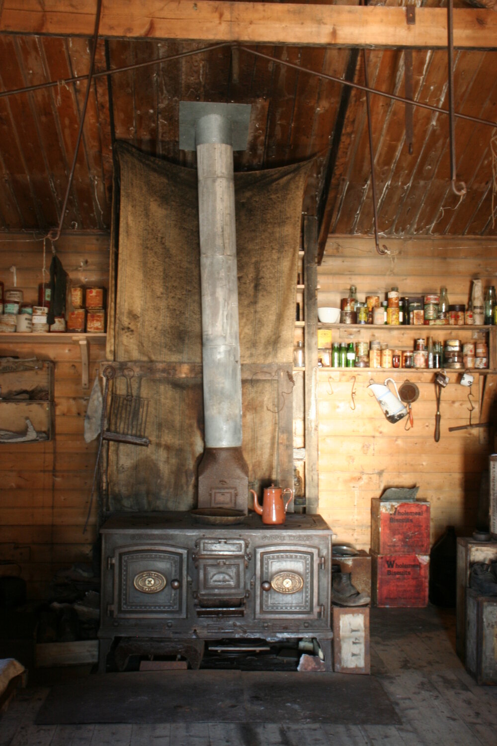 2010-11 Mrs Sam Stove inside Shackleton's 'Nimrod' hut, Cape Royds