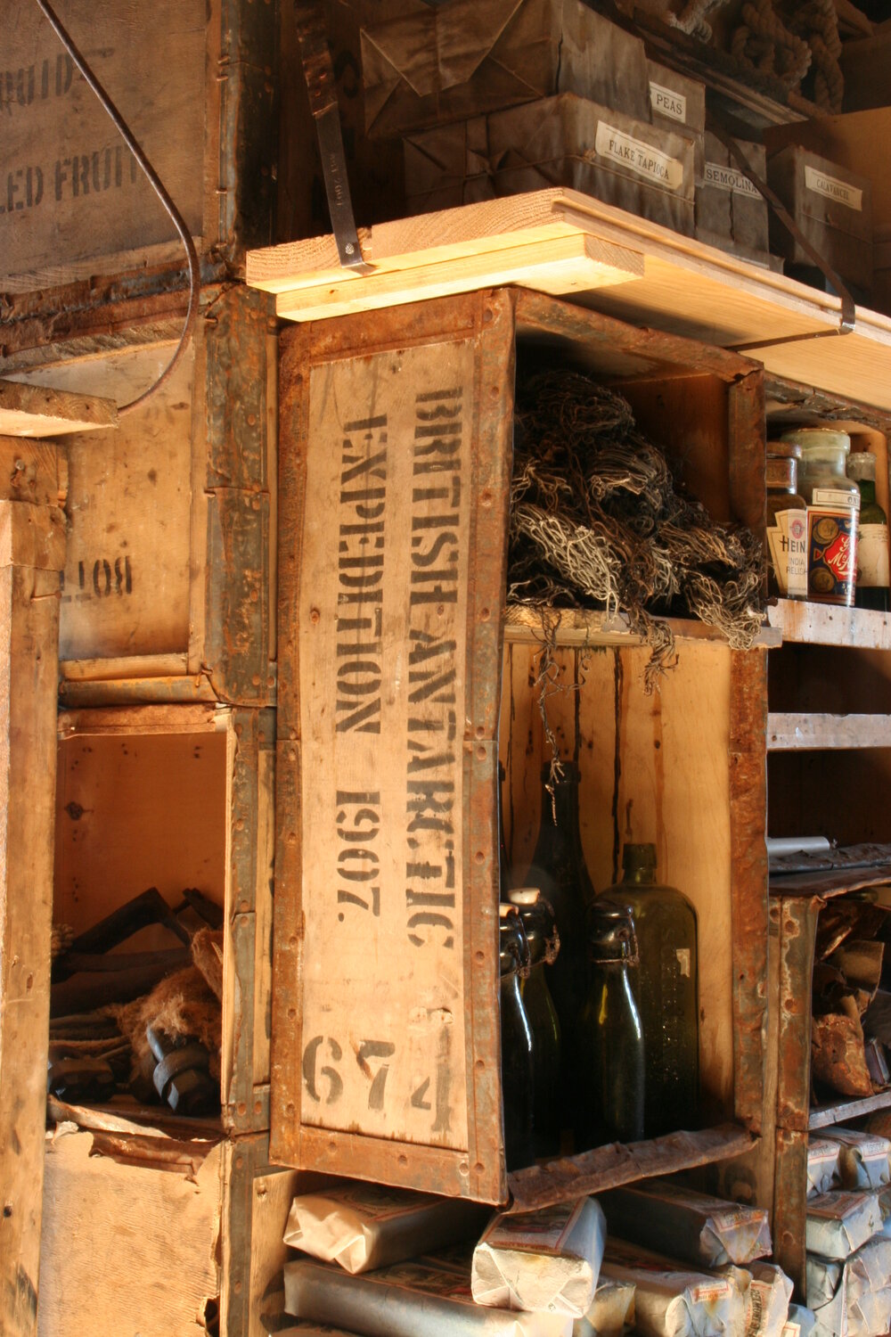 2010-11 Provisions on shelves inside Shackleton's 'Nimrod' hut