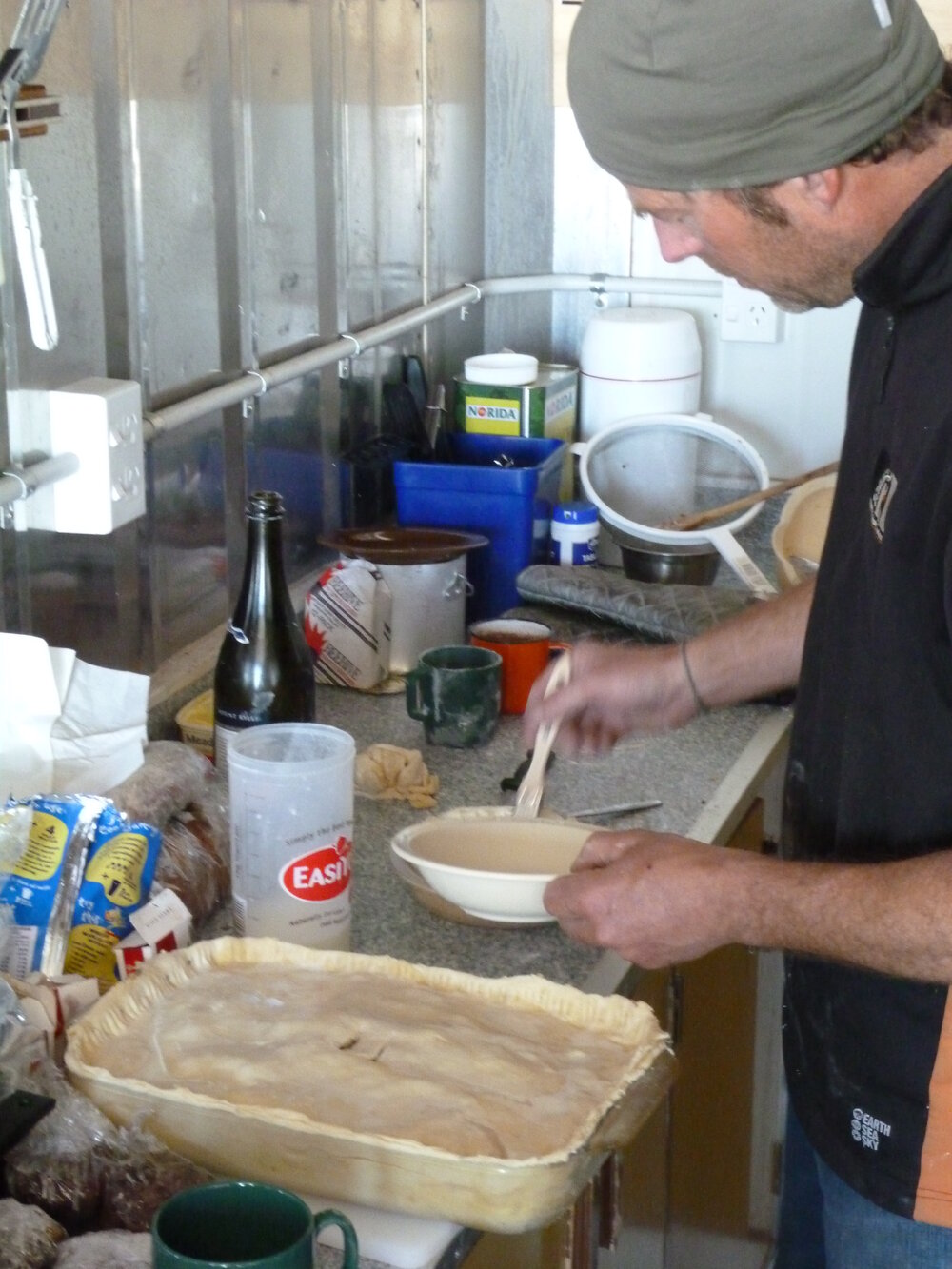 2010-11 Jaime Ward cooking in the field camp kitchen
