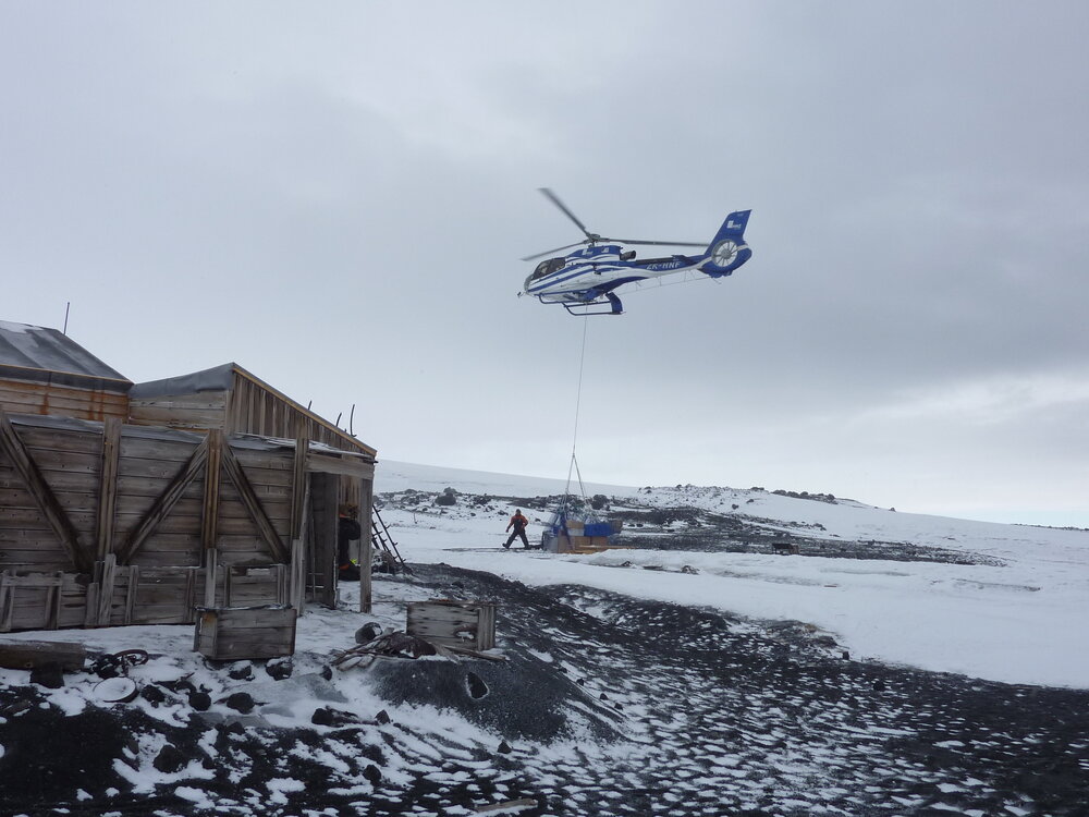 2010-11 Helicopter collecting supplies from Cape Evans