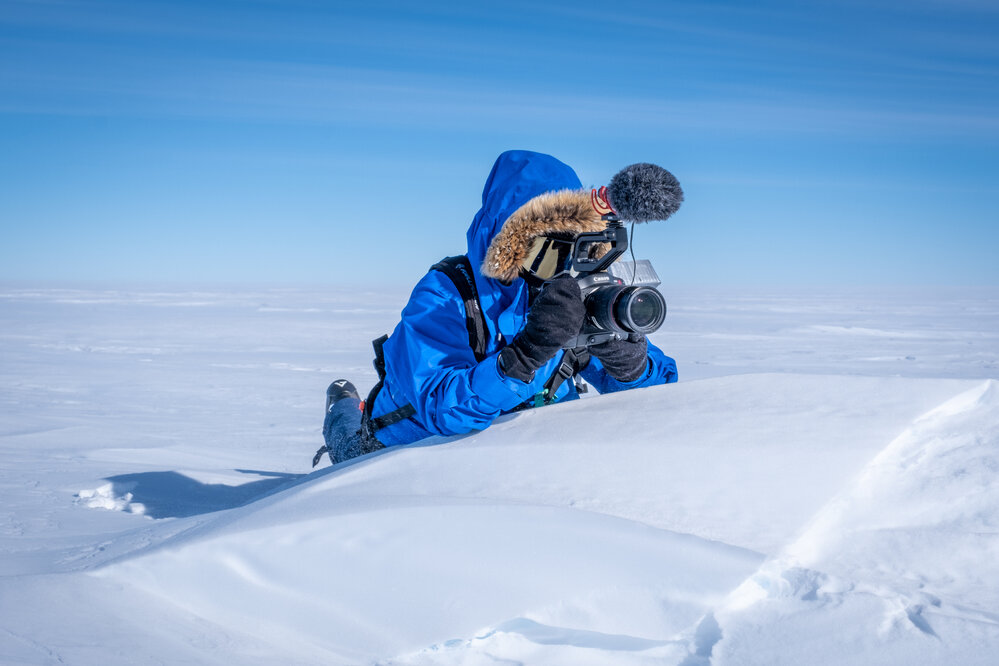 Laura Andrews filming during the South Pole Expedition