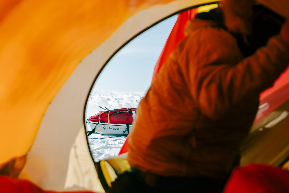 Sled visible through the open tent door