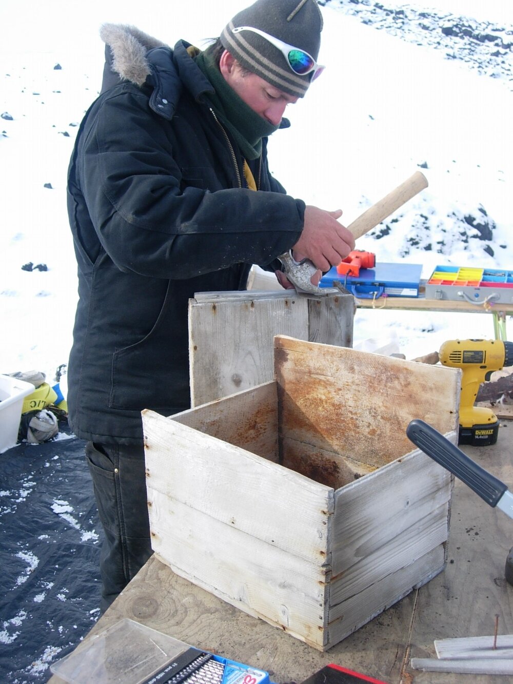 Heritage Carpenter Bryce Lewis repairing boxes from stables wall (001)