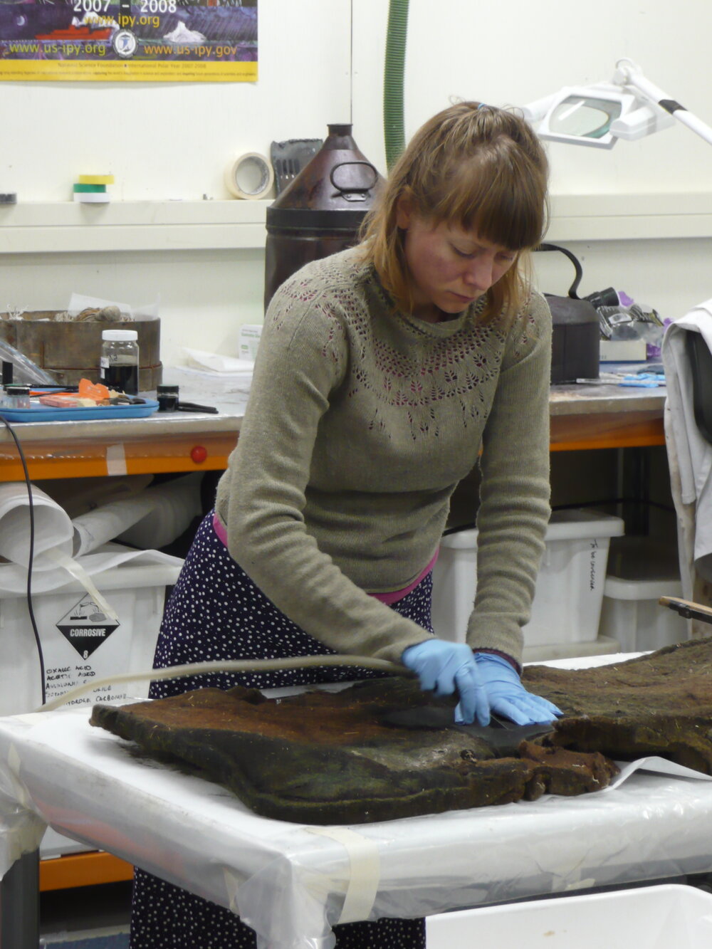 AHT Conservator Carla Pike treating artefact