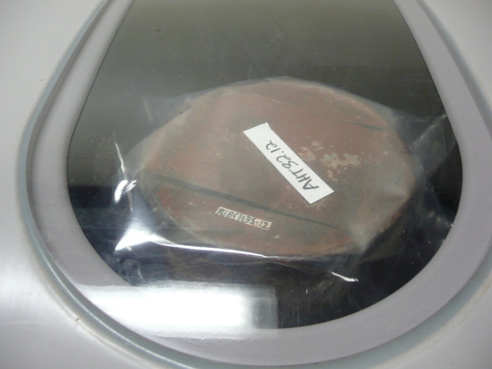 Corroded tin being vacuum sealed (002)