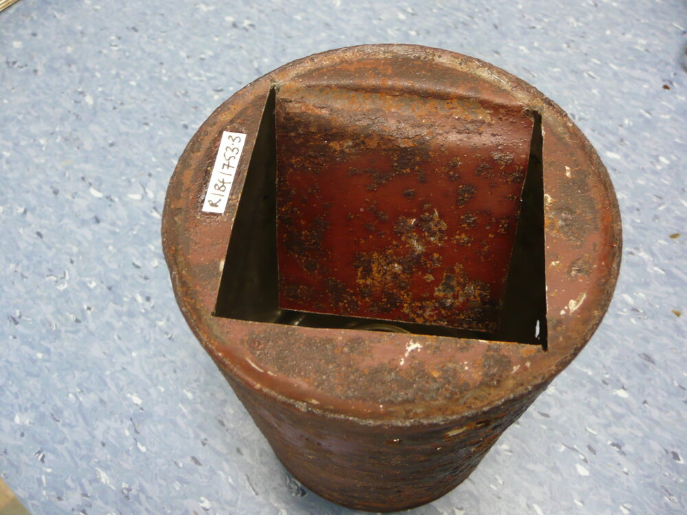 Corroded tin with incision