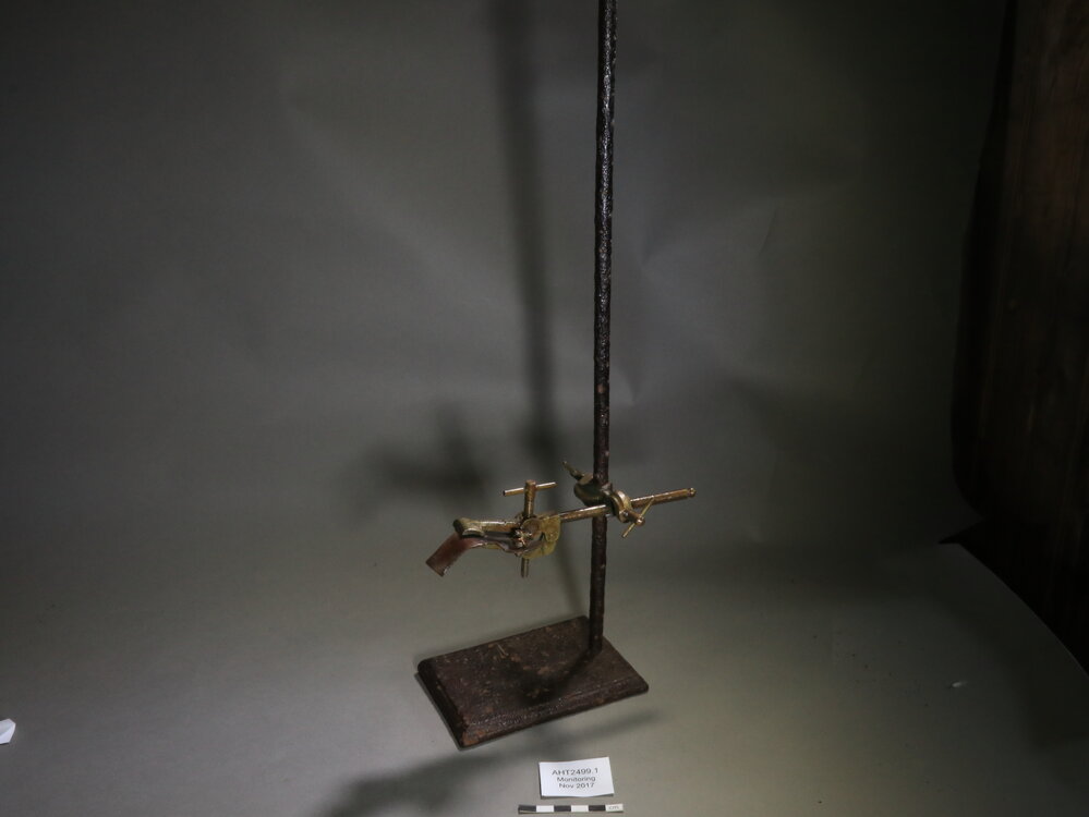 2017-18 Annual artefact monitoring programme, Cape Evans, adjustable clamp stand (001)