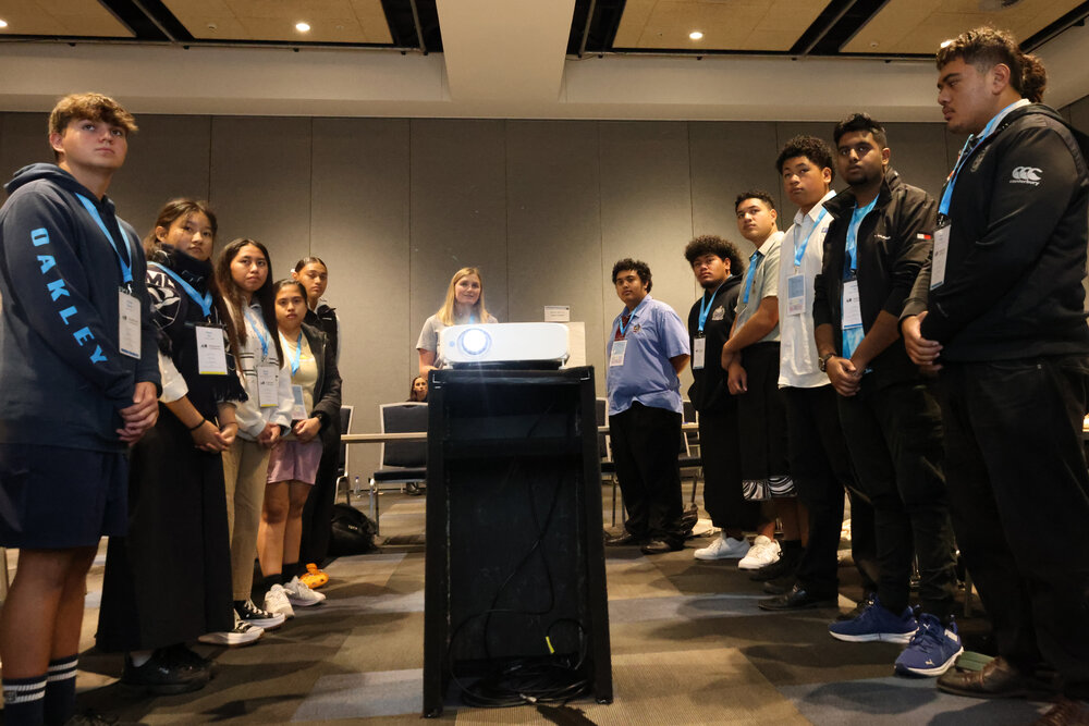 2023 Laura Andrews with students at the Explorer Conference