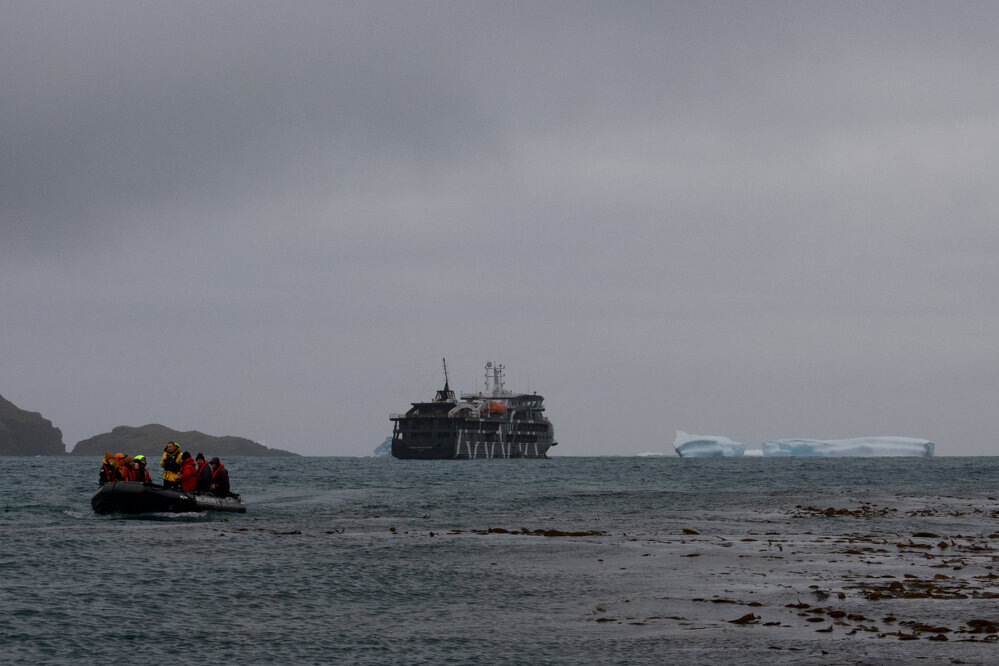 Inspiring Explorers and passengers in a Zodiac, Elsehul Bay
