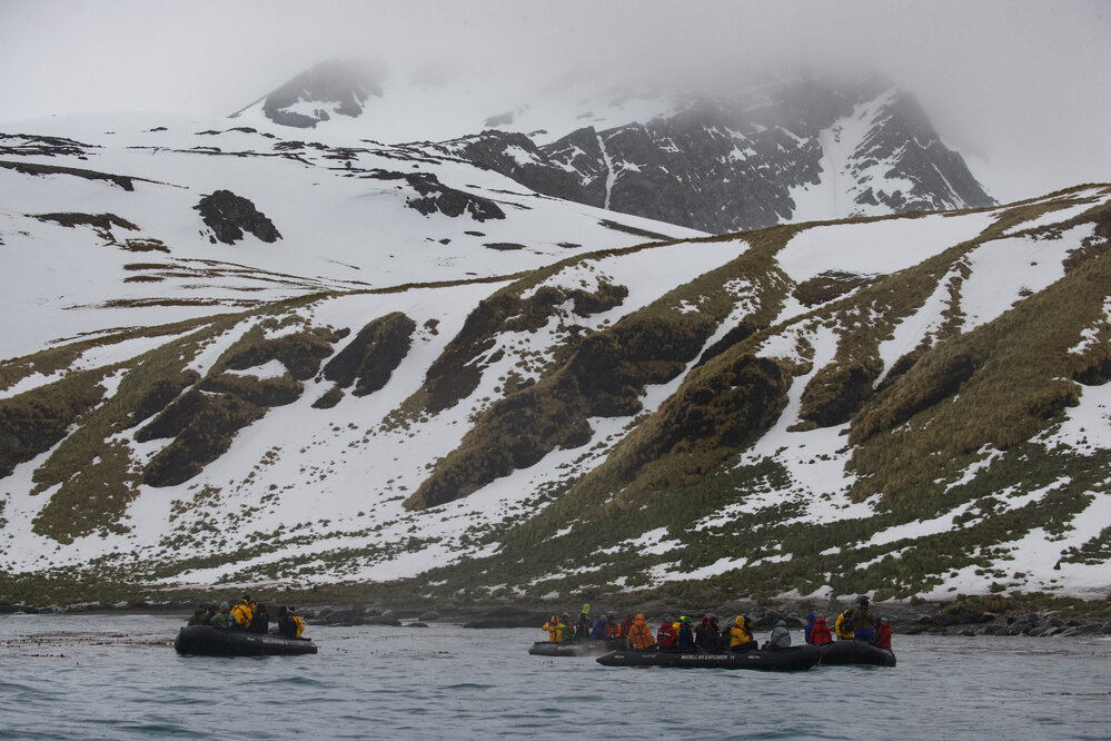 Inspiring Explorers and passengers in a Zodiac, Gold Harbour (001)