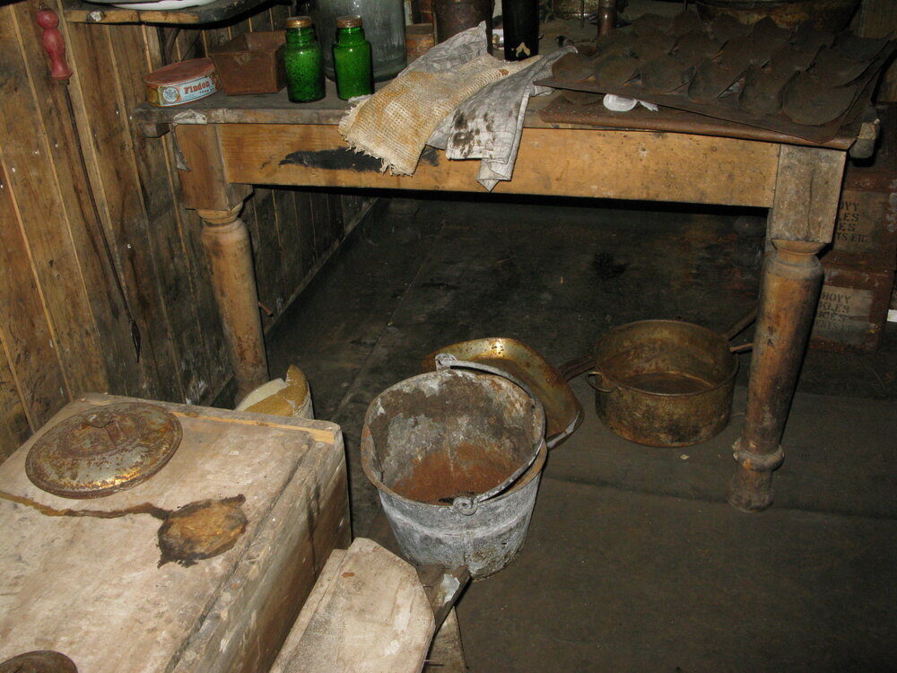 2010-11 Artefacts underneath the Galley table in Scott's 'Terra Nova' hut