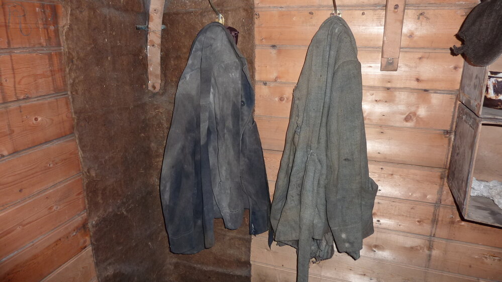 2010-11 Two jackets hanging inside Shackleton's 'Nimrod' hut