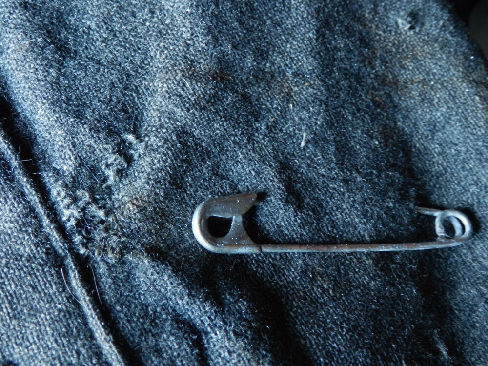Safety pin on wool shirt, Scott's 'Terra Nova' hut