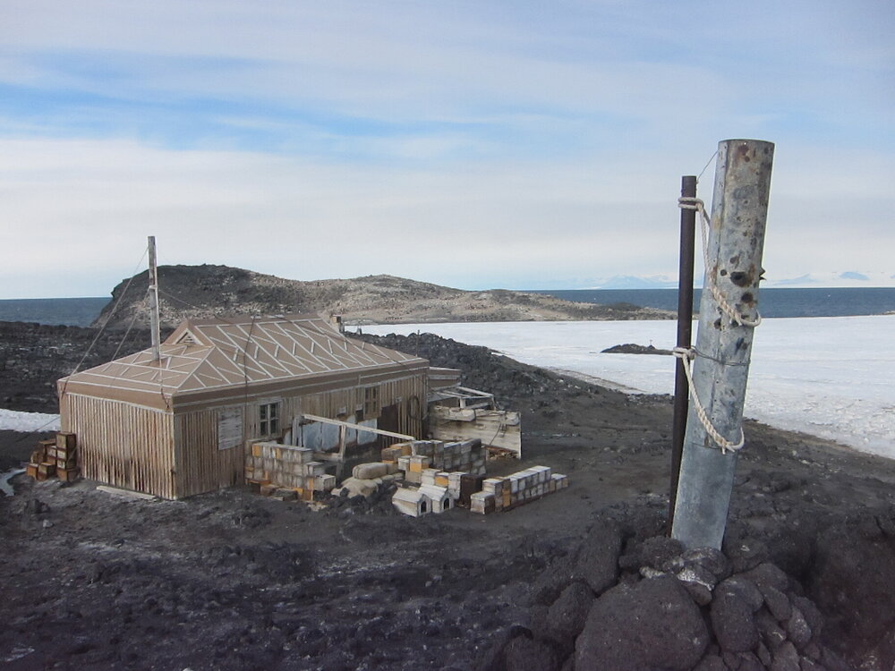 Shackleton's 'Nimrod' hut and Mawson's snow gauge at Cape Royds