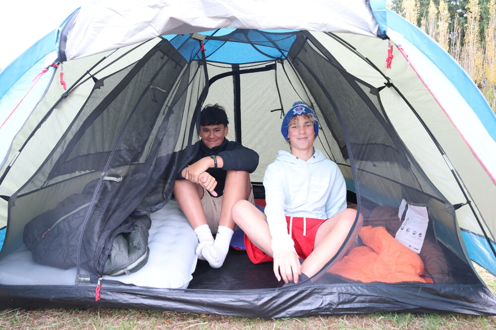 Young Inspiring Explorers with their pitched tent (003)