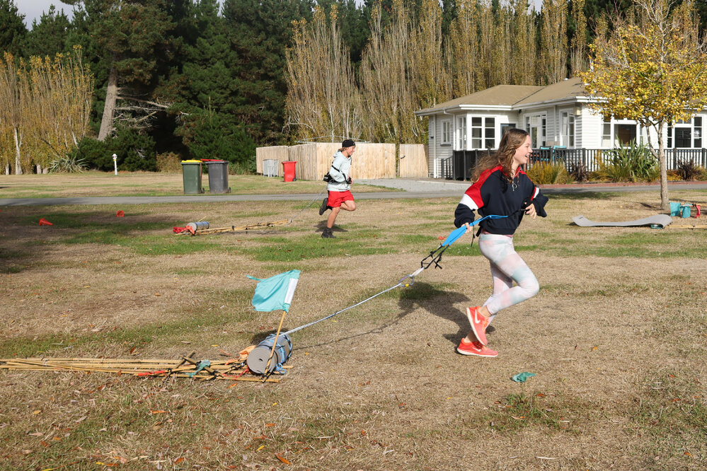 Young Inspiring Explorers race their sleds (006)