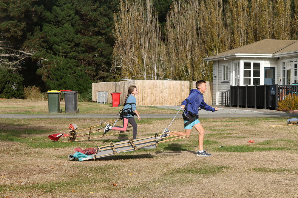 Young Inspiring Explorers race their sleds (007)