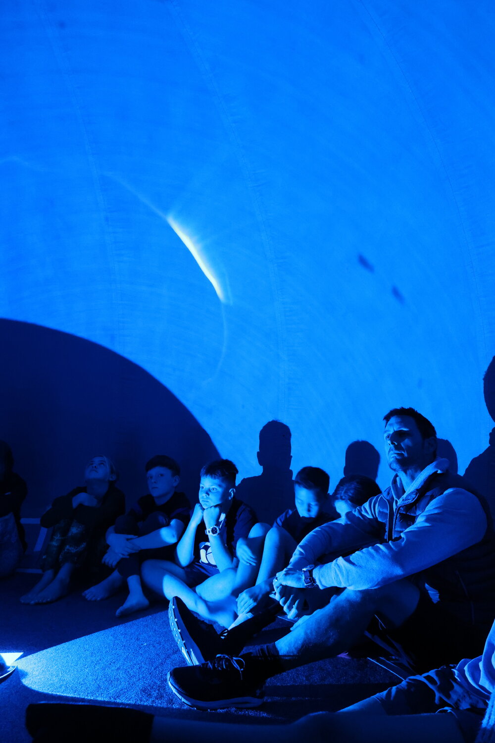 William Pike and Young Inspiring Explorers inside the inflatable planetarium