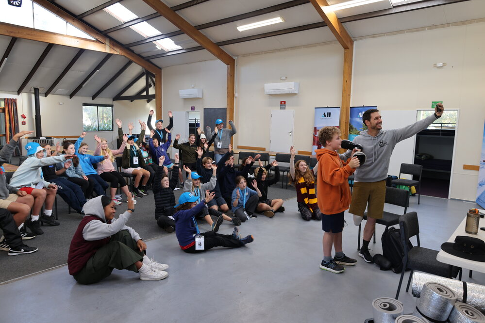 Young Inspiring Explorers take a selfie with William Pike