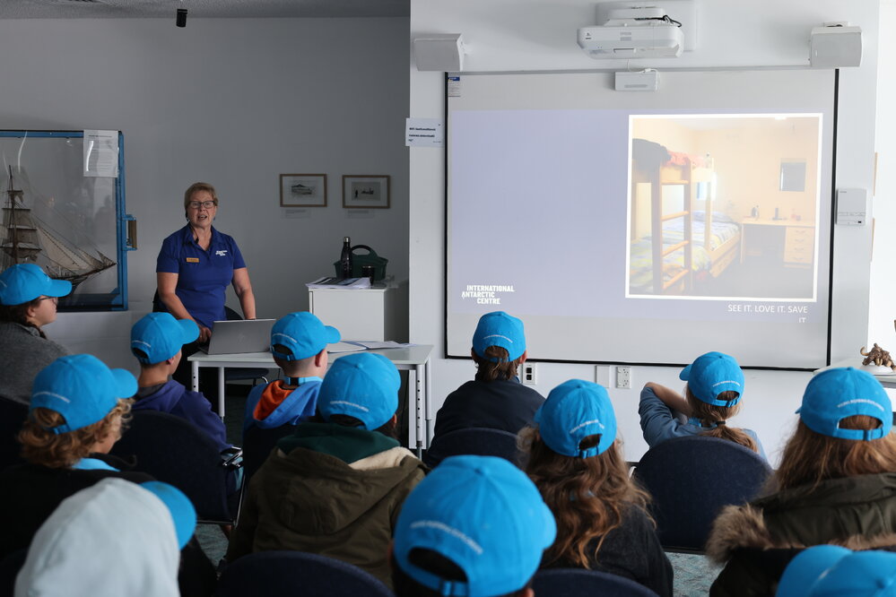 Young Inspiring Explorers attend a presentation at the International Antarctic Centre